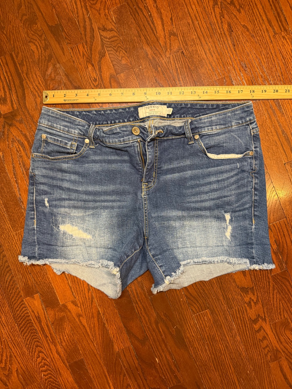torrid Medium Blue Distressed Denim Cutoff Shorts.  Size 16